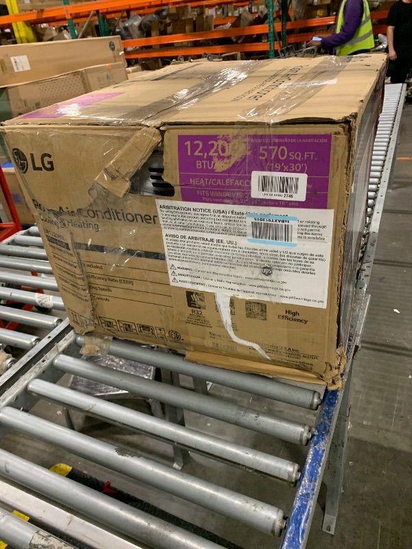 Photo 1 of ** *USED/ UNTESTED/ MANUAL INCLUDED*** LG 12,200 BTU Window Air Conditioner with Supplemental Heat, 230/208V, Cools 570 Sq.Ft. (19' x 30' Room Size), Electronic Controls with Remote, 2 Cooling, Heating & Fan Speeds, Slide In-Out Chassis