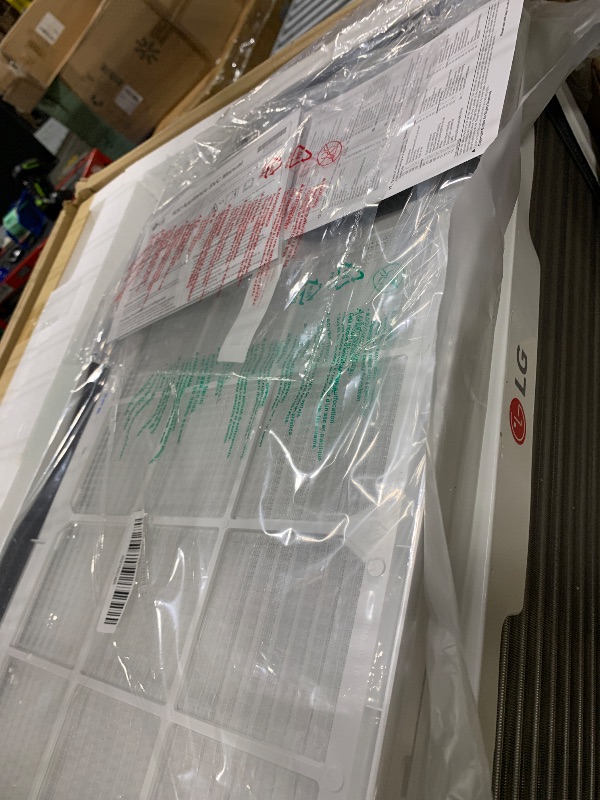 Photo 1 of ** *USED/ UNTESTED/ MANUAL INCLUDED*** LG 12,200 BTU Window Air Conditioner with Supplemental Heat, 230/208V, Cools 570 Sq.Ft. (19' x 30' Room Size), Electronic Controls with Remote, 2 Cooling, Heating & Fan Speeds, Slide In-Out Chassis