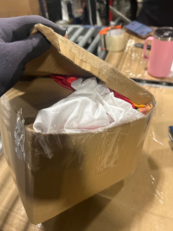 Photo 1 of Leyndo 6 FT Christmas Inflatable Santa Claus Outdoor with a Gift Bag and a Dog Blow Up Decoration with LED Lights Cute Xmas for Holiday Party Yard Garden Lawn Decor