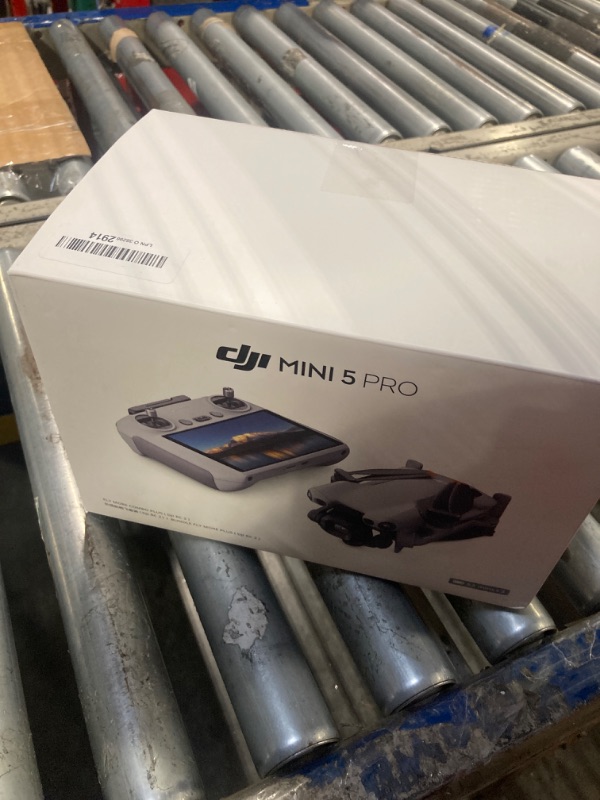Photo 1 of **MISSING PARTS UNKNOWN**
DJI Mini 5 Pro Fly More Combo Plus with DJI RC 2, Drone with Camera, 1-Inch CMOS, 4K Drone for Beginners, Obstacle Sensing, ActiveTrack 360°, 225° Gimbal Rotation, Extended Battery Life