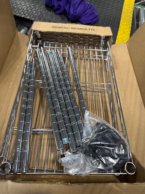 Photo 2 of Amazon Basics 3-Shelf Adjustable Heavy Duty Steel Wire Rack Storage Shelving Organizer for Kitchen, Garage, 23.2" L x 13.4" W x 30" H, Chrome