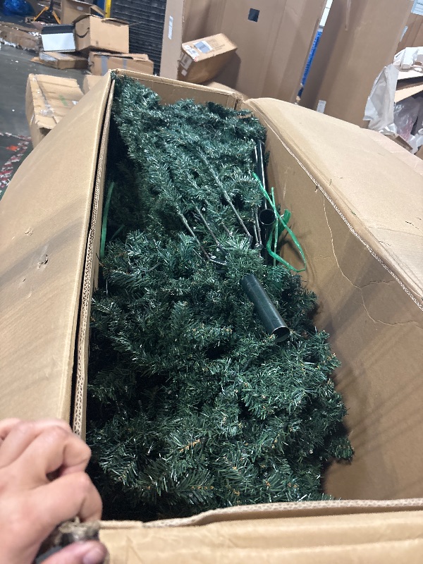 Photo 1 of National Tree Company 9 ft Pre-Lit Dunhill Fir Artificial Christmas Tree, 900 LED Lights, 4,029 Tips, PowerConnect, Foot Pedal, 10 Light Functions, Includes Stand, Green