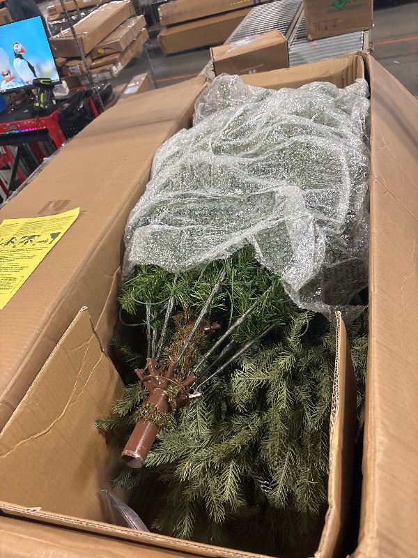 Photo 1 of *See Clerk Notes*
National Tree Company 7.5 ft Pre-Lit Nordic Spruce Medium Artificial Christmas Tree, 900 Clear Lights, 3,790 Tips, Includes Stand, Green