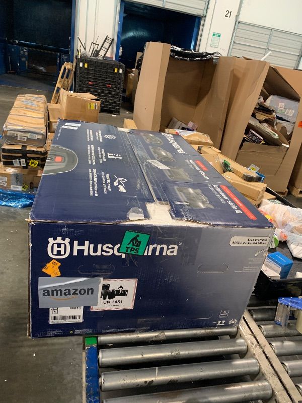 Photo 1 of *******THE LAWNMOWER IS LOCKED AND REQUIRES A PASSWORD TO OPERATE !!!!!!!! WHICH WE DO NOT HAVE !!!!!! ** *** Husqvarna 410iQ Automower Robotic Mower, 0.5 Acre Mowing Capacity, Wire Free Robot Lawn Mower with Charging Station, RS1 EPOS Reference Station a