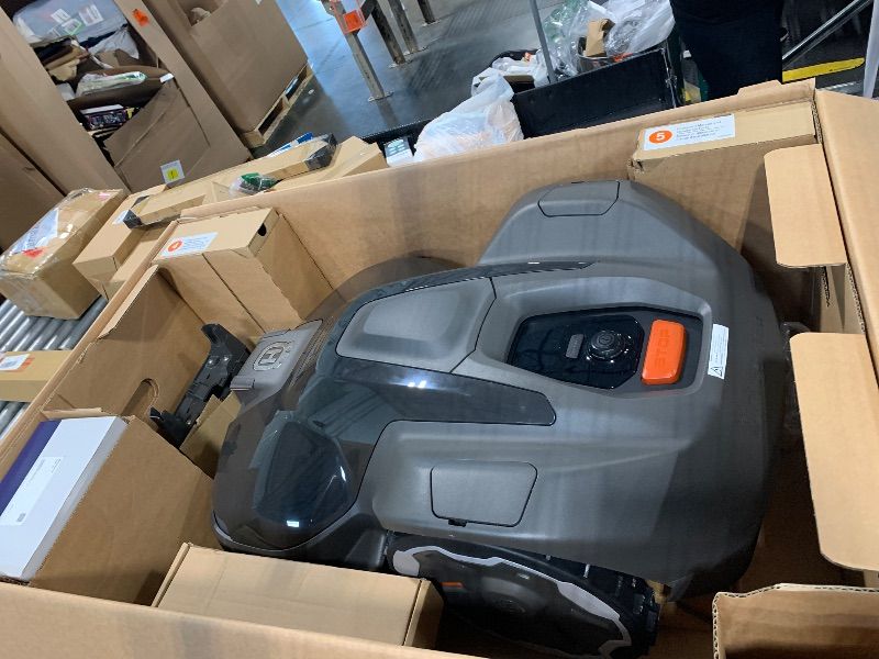Photo 1 of *******THE LAWNMOWER IS LOCKED AND REQUIRES A PASSWORD TO OPERATE !!!!!!!! WHICH WE DO NOT HAVE !!!!!! ** *** Husqvarna 410iQ Automower Robotic Mower, 0.5 Acre Mowing Capacity, Wire Free Robot Lawn Mower with Charging Station, RS1 EPOS Reference Station a