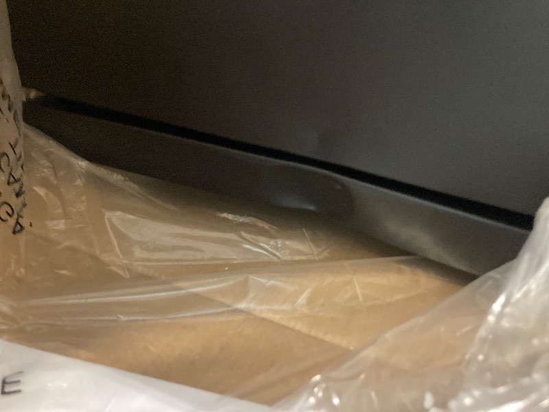 Photo 1 of   ** MINOR DENT ON TOP OF DOOR *** Masterbuilt® 30-inch Digital Electric Vertical BBQ Smoker with Leg Kit, Side Wood Chip Loader and 710 Cooking Square Inches in Black, Model MB20070421