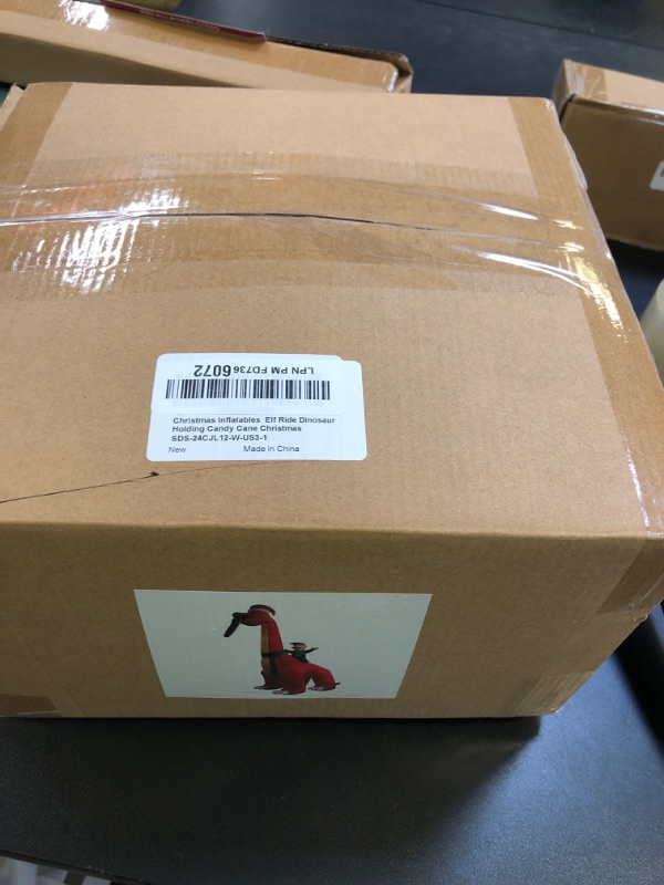 Photo 1 of 12 Ft Ht x 14 Ft L Giant Christmas Inflatables Santa Elf Ride Dinosaur Holding Candy Cane Christmas Blow Up Yard Decorations Built-in LEDs Christmas Decorations Outdoor Party Holiday Xmas Decor Lawn