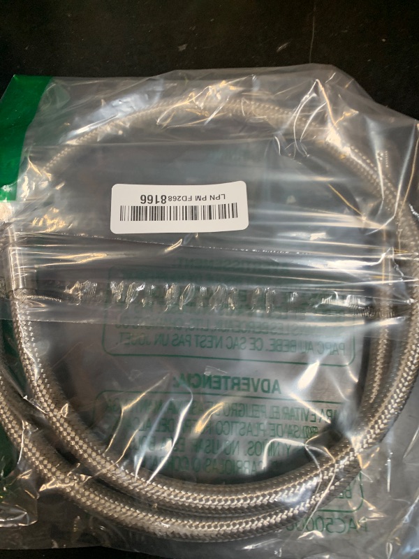 Photo 1 of 1/4" Stainless Steel PTFE Reinforced Hose, 1/4" NPT male, 40" Length, 870PSI, -40°F to 400°F
