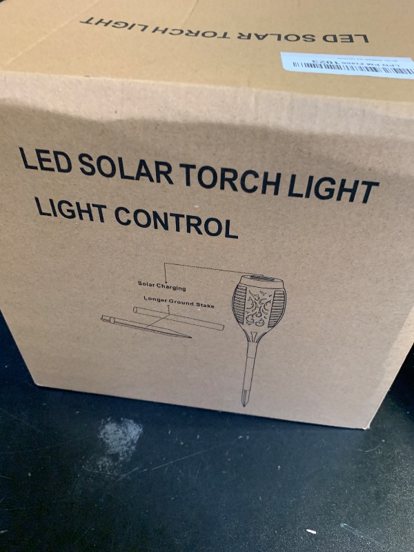 Photo 1 of 10 Pack Solar Lights Outdoor, Mini Solar Torch Lights with Flickering Flame for Halloween Decor, Solar Halloween Lights Waterproof Solar Powered Outdoor Lights for Garden Pathway Patio Yard Porch