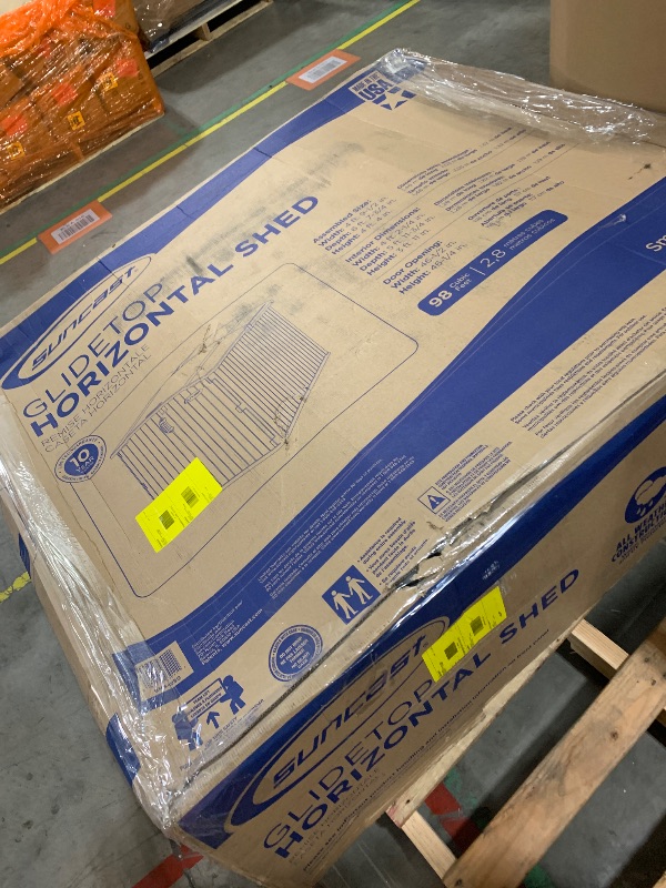 Photo 1 of Suncast 138 Cu Ft Horizontal Outdoor Storage Shed, 57.5"x79.75"x52" Glidetop Outdoor Shed with Sliding Lid, Resin Storage Sheds with Floor for Bikes, Motorcycles, & Lawn Mower, Made in The USA