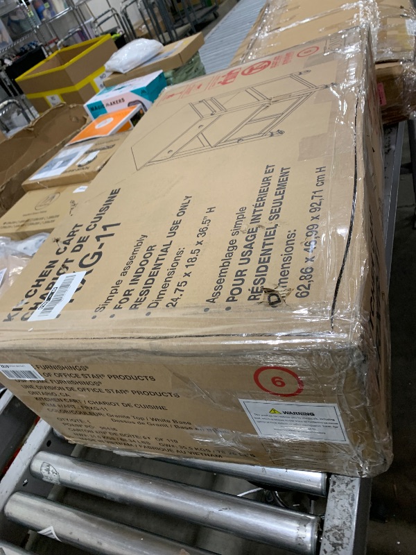 Photo 1 of OSP Home Furnishings Fairfax Farmhouse Kitchen Cart with Granite Top, Rolling Storage Cabinet with Towel Rack, Shelf and Drawer, White Finish