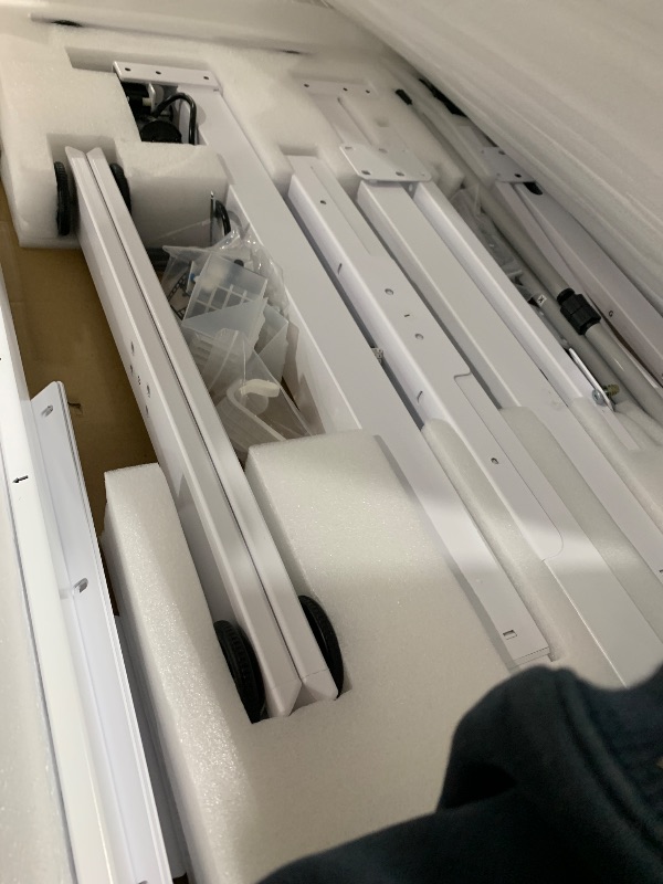 Photo 1 of MISSING MAN PIECES********Huuger L Shaped Standing Desk with Power Outlets, 63 x 55 Inch Height Adjustable Computer Desk for Bedroom, Corner Stand up Desk for Home and Office, Work and Study, White