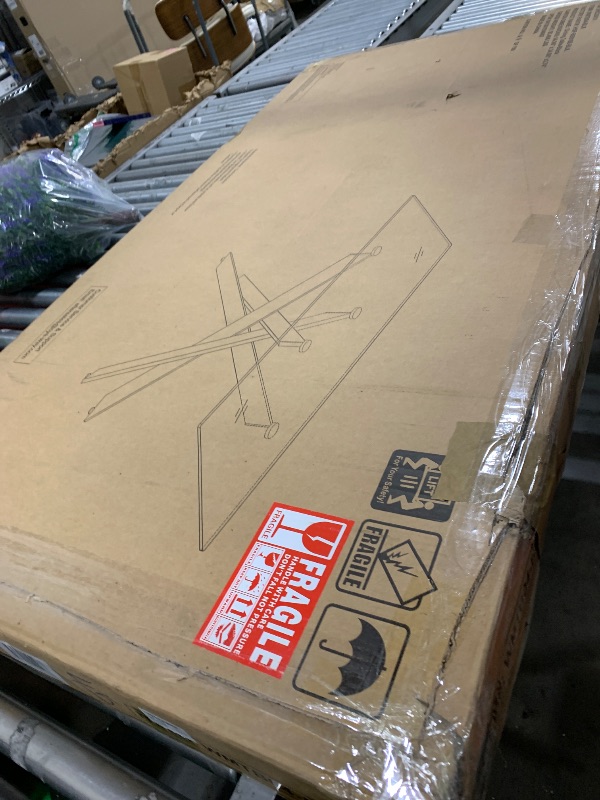 Photo 1 of Modern Style Dining Table with Gray Tempered Glass Top and Black Metal Tubular Legs, 58.5”Lx29”Wx30”H