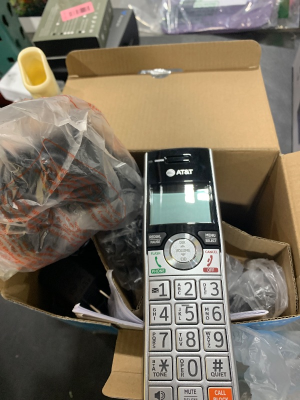 Photo 1 of AT&T CL82407 DECT 6.0 4-Handset Cordless Phone for Home with Answering Machine, Call Blocking, Caller ID Announcer, Intercom and Long Range, Silver