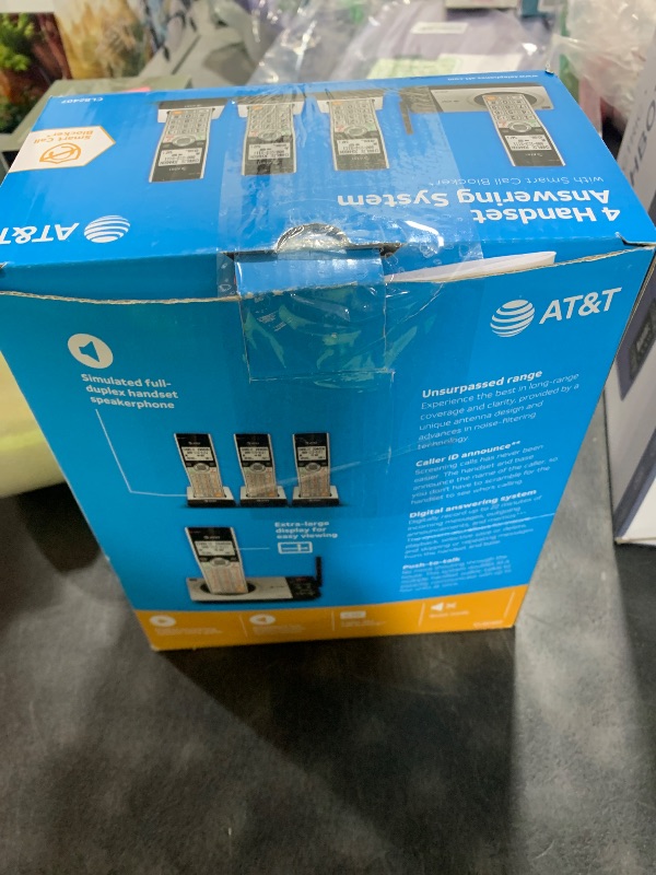 Photo 1 of AT&T CL82407 DECT 6.0 4-Handset Cordless Phone for Home with Answering Machine, Call Blocking, Caller ID Announcer, Intercom and Long Range, Silver