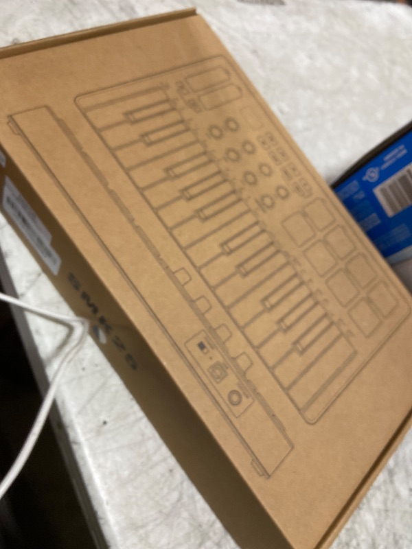 Photo 1 of DaierTek Midi Keyboard Controller 25 Key Portable Mini Bluetooth & USB Midi Piano with 8 Backlit Drum Pad, 8 Knobs and Music Production Software for Computer Recording, Music Production