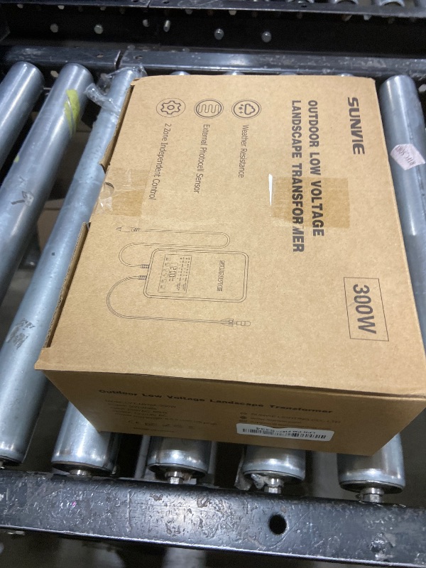 Photo 1 of SUNVIE 300W Low Voltage Landscape Transformer with 2 Independent Control Output Landscape Lighting Transformer with Timer and Photocell Sensor 120V AC to 12/14V AC Weatherproof Low Voltage Transformer