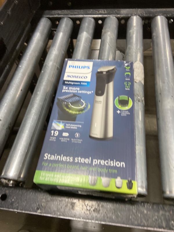 Photo 1 of Norelco Philips Multigroom 7000 Series, All-in-One Trimmer, Beard Trimmer and Hair Clipper, 19-Piece Men's Grooming Kit for Beard, Head, Hair, Body, and Face, Soft Pouch, MG7910/49