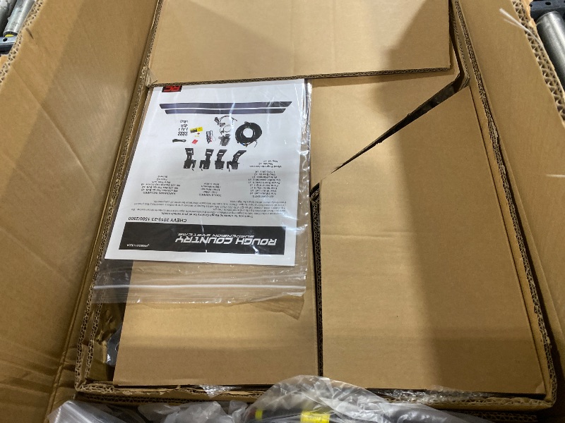 Photo 1 of Rough Country Power Running Boards for Chevy Silverado & GMC Sierra 1500/2500HD/3500HD (2019-2026) Crew Cab - Dual-Motor Electric Retractable Side Steps with LED Truck Step Lights