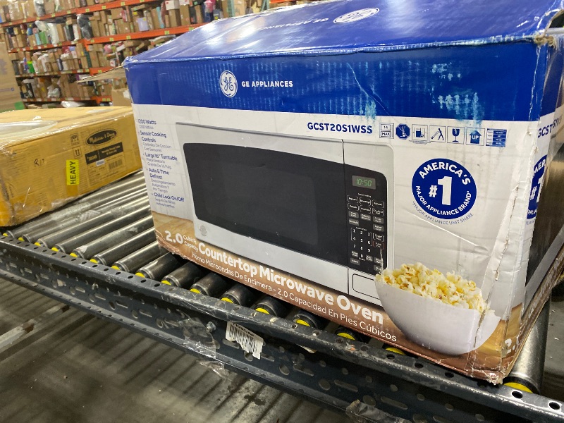 Photo 1 of GE Countertop Microwave Oven,1, 200-watt Capacity, 2.0 Cubic Ft., 8 Auto Setting Cooking Settings, Child-Lock Technology, Kitchen Essentials for the Countertop, Dorm Room or Apartment, Stainless Steel