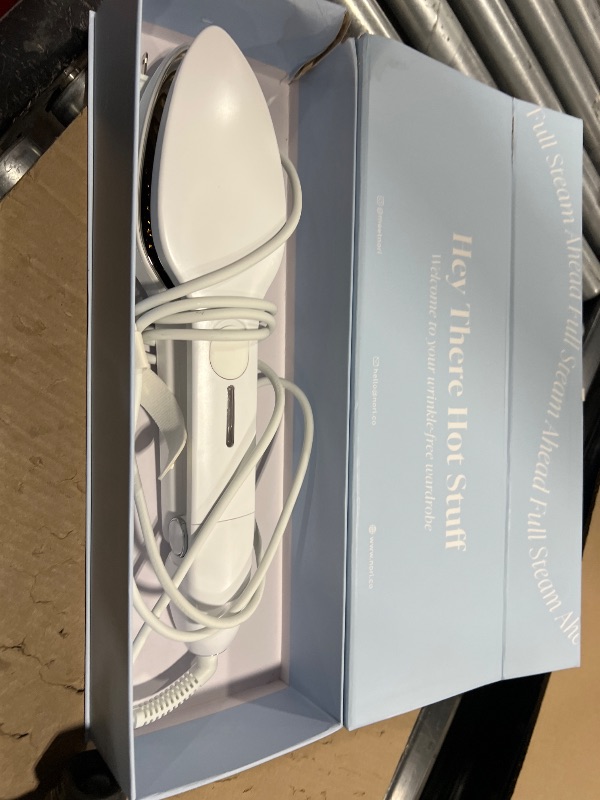 Photo 1 of Nori Press Travel Steam Iron - Handheld Iron With Optional Steam Feature - No Ironing Board Required - Easy to Use w/ 6 Fabric Settings - Removes Wrinkles - User Manual Included -White