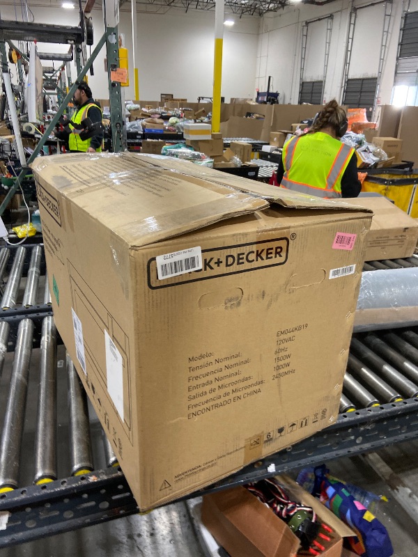 Photo 1 of BLACK+DECKER EM044KB19 Over The Range Microwave Oven with One Touch, 1000 Watts, 400 CFM and Auto Cooking, OTR 1.9 Cu.ft