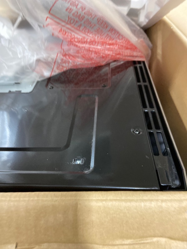 Photo 1 of BLACK+DECKER EM044KB19 Over The Range Microwave Oven with One Touch, 1000 Watts, 400 CFM and Auto Cooking, OTR 1.9 Cu.ft