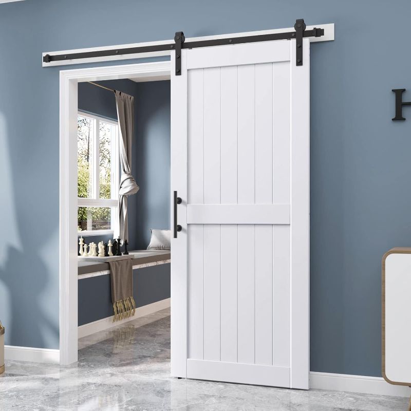 Photo 1 of EaseLife 36 x 96 inch White Barn Door with 6.6FT Sliding Door Hardware Kit Included & Handle,Solid Wood Covered with Waterproof PVC Surface,DIY Assemblely,Easy Install,H-Frame,Fit 32-34in Wide Opening