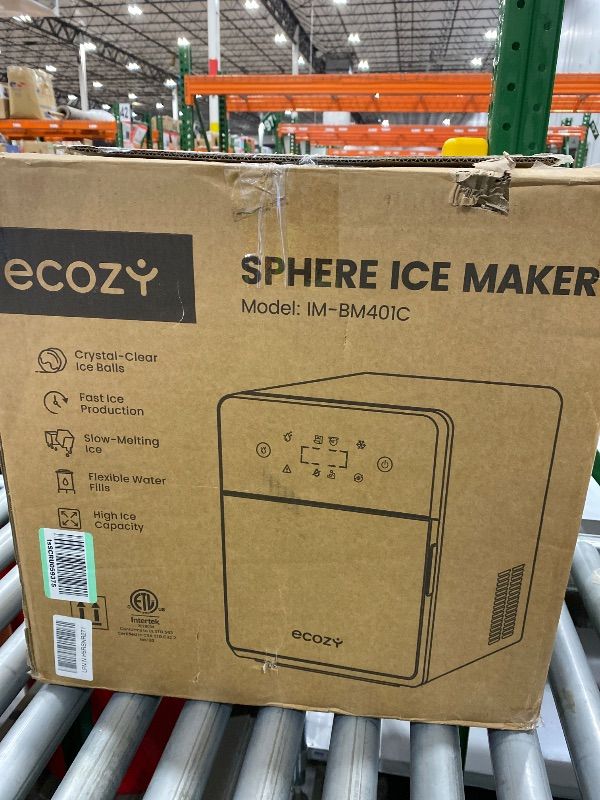 Photo 1 of *See Clerk Notes*
ecozy 2" Clear Ice Ball Maker with CrystalFlux Technology, 4 pcs in 40 Mins, 144 pcs/Day, Sphere Ice Maker with Automatic Water Supply, Self-Cleaning, Enhanced Insulation for Whiskey & Bourbon