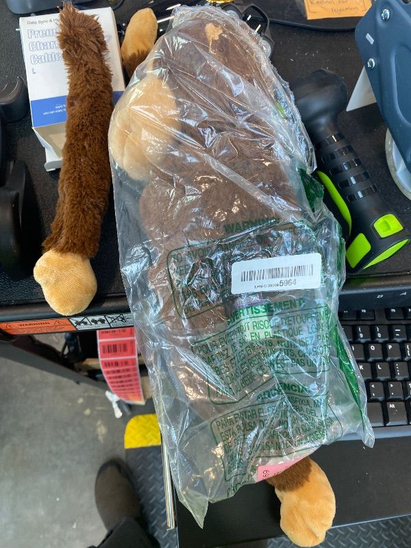 Photo 1 of ***MAJOR DAMAGE*** Multipet Swingin' Safari Monkey Dog Plush Toy - Squeaky Dog Toy for All Dogs - Extra Soft Plush Dog Toy - Stuffed Animal Dog Toy for Cuddling & Playing - Cute Dog Pet Toy (27”, Brown, 5 Squeakers)