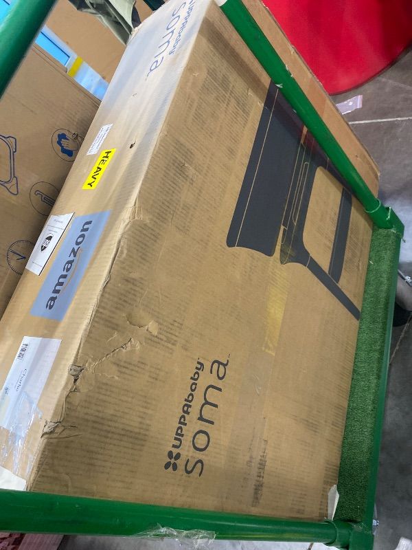 View 2 of *MINOR DAMAGE - USED*
UPPAbaby Soma Smart Bassinet – 5 motions + 5 speeds + 4 Sounds with MotionSync Technology – Height Adjustable – Included Mattress, Sheet + Storage Basket – Charlie (Sand Mélange)