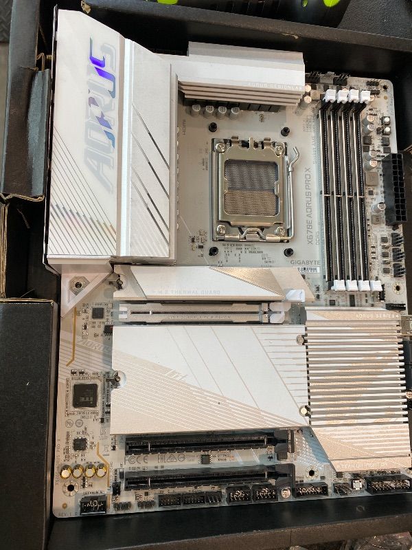 View 2 of **FOR PARTS**
GIGABYTE X670E AORUS PRO X (AM5/ LGA 1718/ AMD/ X670E/ EATX/ 5-Year Warranty/ DDR5/ Quad M.2/ PCIe 5.0/ USB 3.2 Gen2X2 Type-C/WiFi 7/ Intel 2.5GbE LAN/Q-Flash Plus/EZ-Latch Plus/Motherboard) (Renewed)