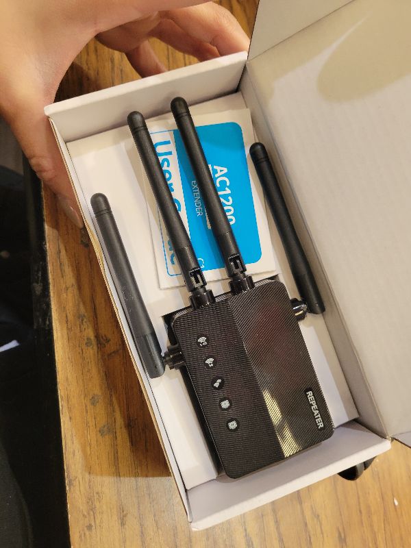 Photo 1 of 1200Mbps Dual Band 5GHz/2.4GHz WiFi Extender, WiFi Extender Signal Booster, 12880 Sq.Ft Coverage, 105-Device Support, Setup for Home & Outdoor Use