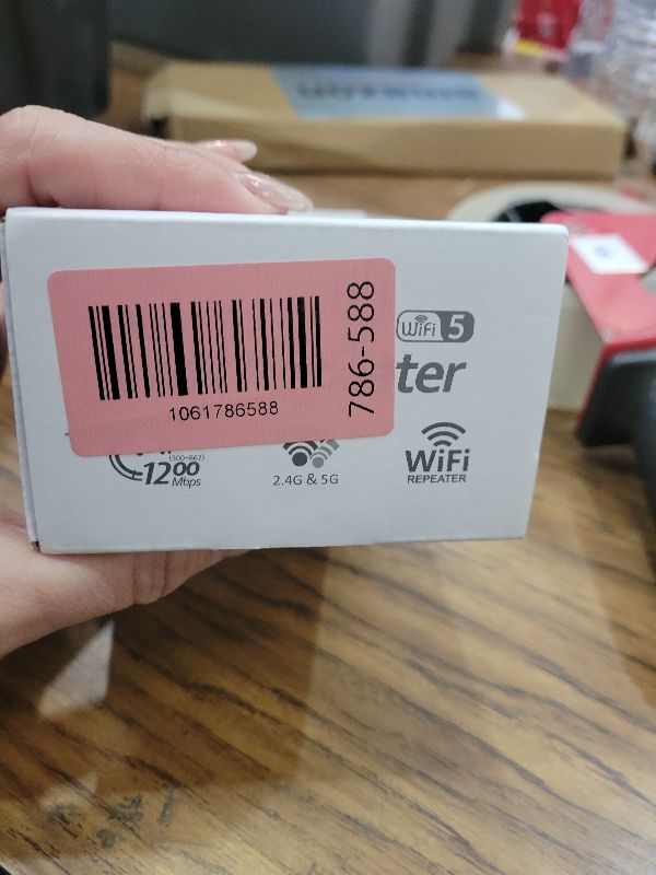 Photo 1 of 1200Mbps Dual Band 5GHz/2.4GHz WiFi Extender, WiFi Extender Signal Booster, 12880 Sq.Ft Coverage, 105-Device Support, Setup for Home & Outdoor Use