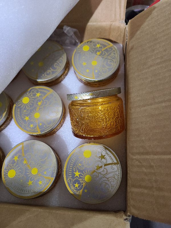 Photo 1 of 18-Pack 4oz Embossed Glass Candle Jars with Lids and Labels - Sun Moon Stars Design (Orange)