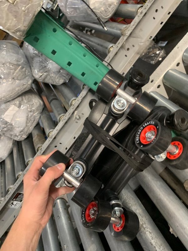 Photo 1 of (used)(minor damage) Chicago Boys' Classic Quad Roller Skates Black Junior Rink Skates, Size J12