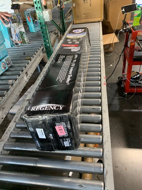 Photo 1 of * USED MISSING PARTS*E-Z UP Regency 10' x 10' Straight Leg Canopy with Side Wall and 4 Weight Bags BLUE