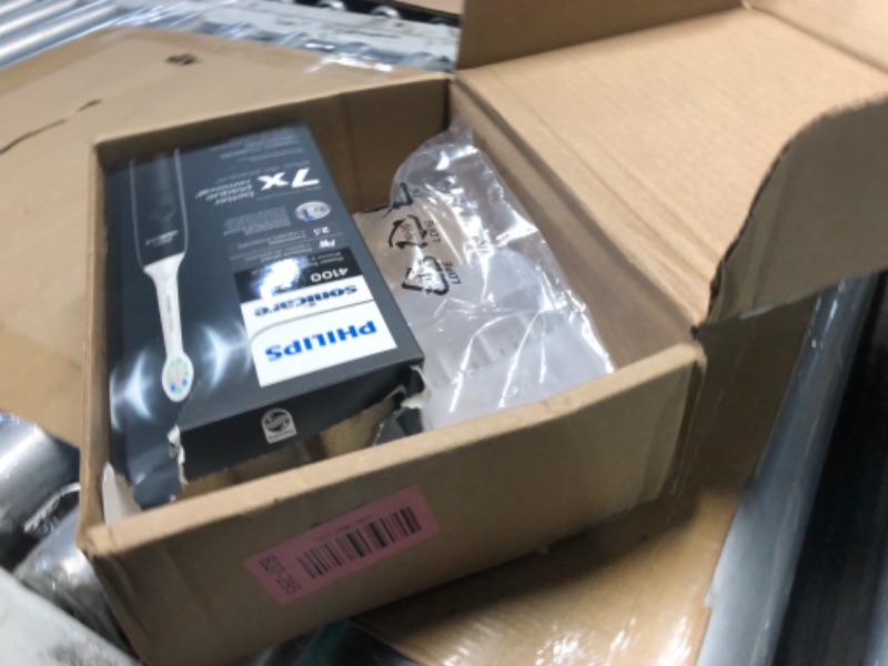 Photo 1 of (used) 
Philips Sonicare 4100 Rechargeable Electric Toothbrush, Advanced Plaque Removal, Pressure Sensor, Includes Brush Head Case, Black BD5003AZ