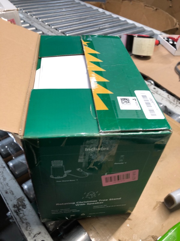 Photo 1 of ?Patent Pending? Musical Rotating Christmas Tree Stand, UL Certified Up to 9ft 120 lb Artificial Christmas Tree with Speaker, Spinning Stand with Remote, Fit for 1.25-2" in Tree Poles - 800W