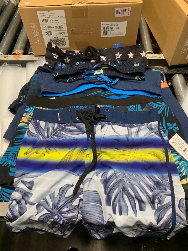 Photo 1 of ***(HEAVILY USED/ MISSING SOME TAGS)***Variety pack of different styles/sizes of men burnside swim trunks