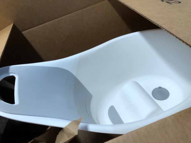 Photo 1 of ****STOCK PHOTO REFRENCE***Munchkin® Sit & Soak™ Baby Bath Tub with Bath Rinser