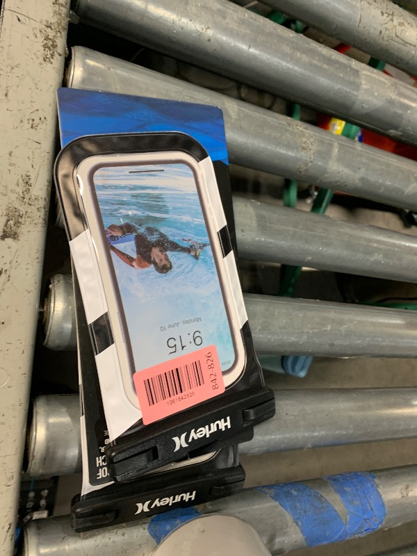 Photo 1 of (missing lanyard) hurley water proof phone pouch