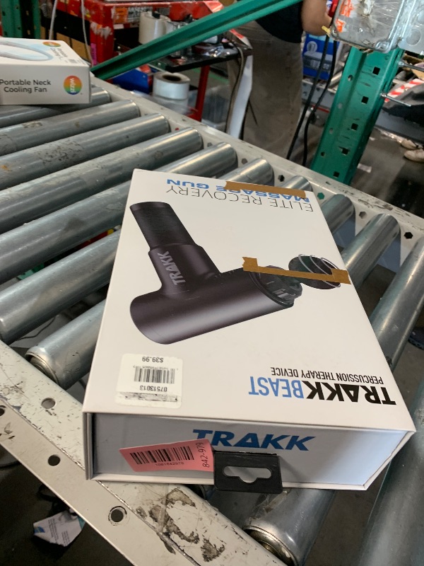 Photo 1 of (missing charger) TRAKK Beast Deep Tissue Percussion Massage Gun, Rechargeable Handheld 6 Speed Cordless Massager, 4 Interchangeable Heads (Black)