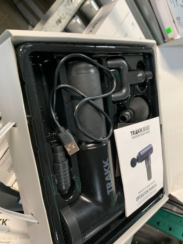 Photo 1 of (missing charger) TRAKK Beast Deep Tissue Percussion Massage Gun, Rechargeable Handheld 6 Speed Cordless Massager, 4 Interchangeable Heads (Black)