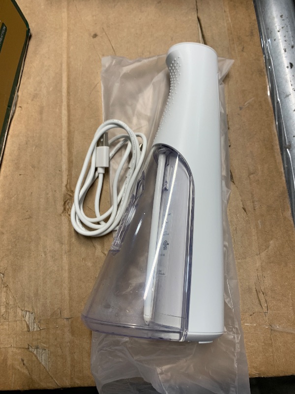 Photo 1 of (unknown if complete) Waterpik Cordless Pulse Rechargeable Portable Water Flosser for Teeth, Gums, Braces Care