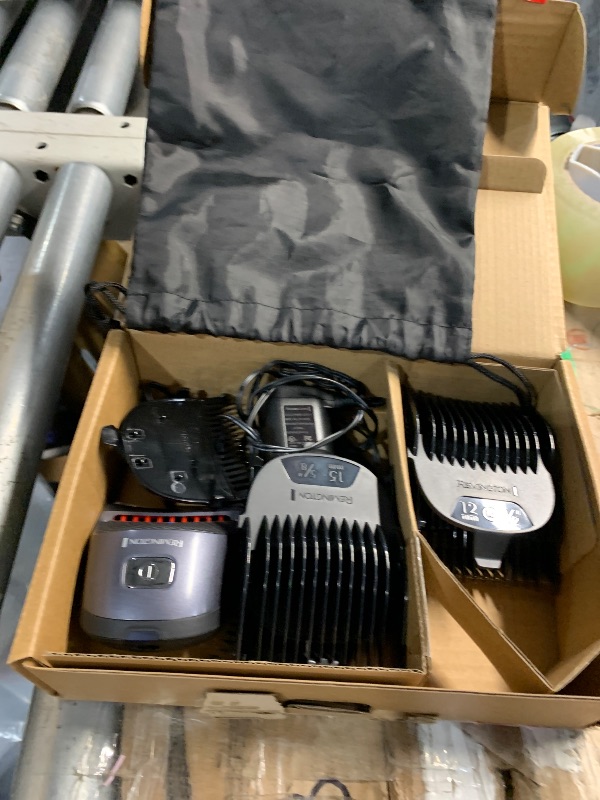 Photo 1 of ****(HEAVILY USED/ MINOR DAMAGE)***Remington Shortcut Pro Self-Haircut Trimmer Kit, Waterproof Cordless Electric Razor for Head, Beard, and Body, Curved Blades and 9 Trimmer Lengths, Head Shaver, 5-Minute Quick-Charge, 14-Piece Set