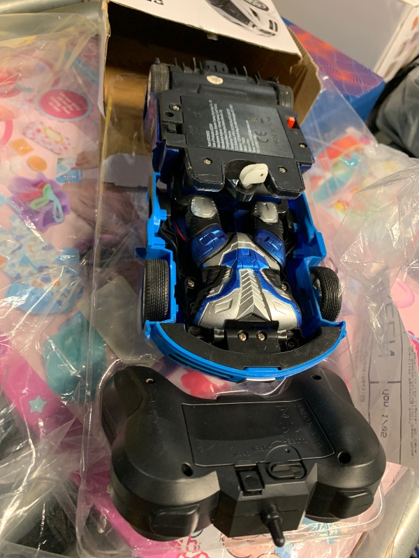 Photo 1 of ***(PARTS ONLY/ MAJOR DAMAGE/ NON FUNCTIONAL)***AONEPTR Remote Control Car, One-Click Becoming Robot Transforming Toys Car for Boys, Smooth Deformation, Demo Mode, 360° Rotation, Easy to Use, 2.4GHZ, with LED Lights, RC Cars for Christmas, Kids