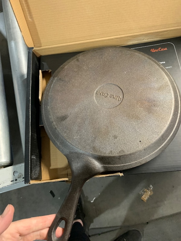 Photo 1 of ***(HEAVILY USED/ MINOR DAMAGE)***Uno Casa Cast Iron Comal Pan 10.5 Inch - Skillet for Roti, Tawa/Dosa Pan Pataconera, Comales para Tortillas - Comal Para Tortillas Grande - Cast Iron Griddle