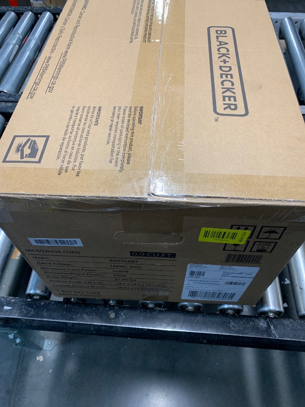 Photo 1 of ***FACTORY SEAL***BLACK+DECKER Digital Microwave Oven with Turntable Push-Button Door, Child Safety Lock, Stainless Steel, 0.9 Cu Ft