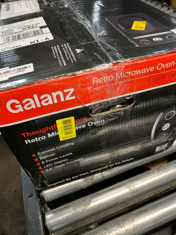 Photo 1 of ***(PARTS ONLY/ MAJOR DAMAGE/ NON FUNCTIONAL)***Galanz GLCMKA07BKR-07 Microwave Oven, LED Lighting, Pull Handle Design, Child Lock, Retro Black, 0.7 cu ft